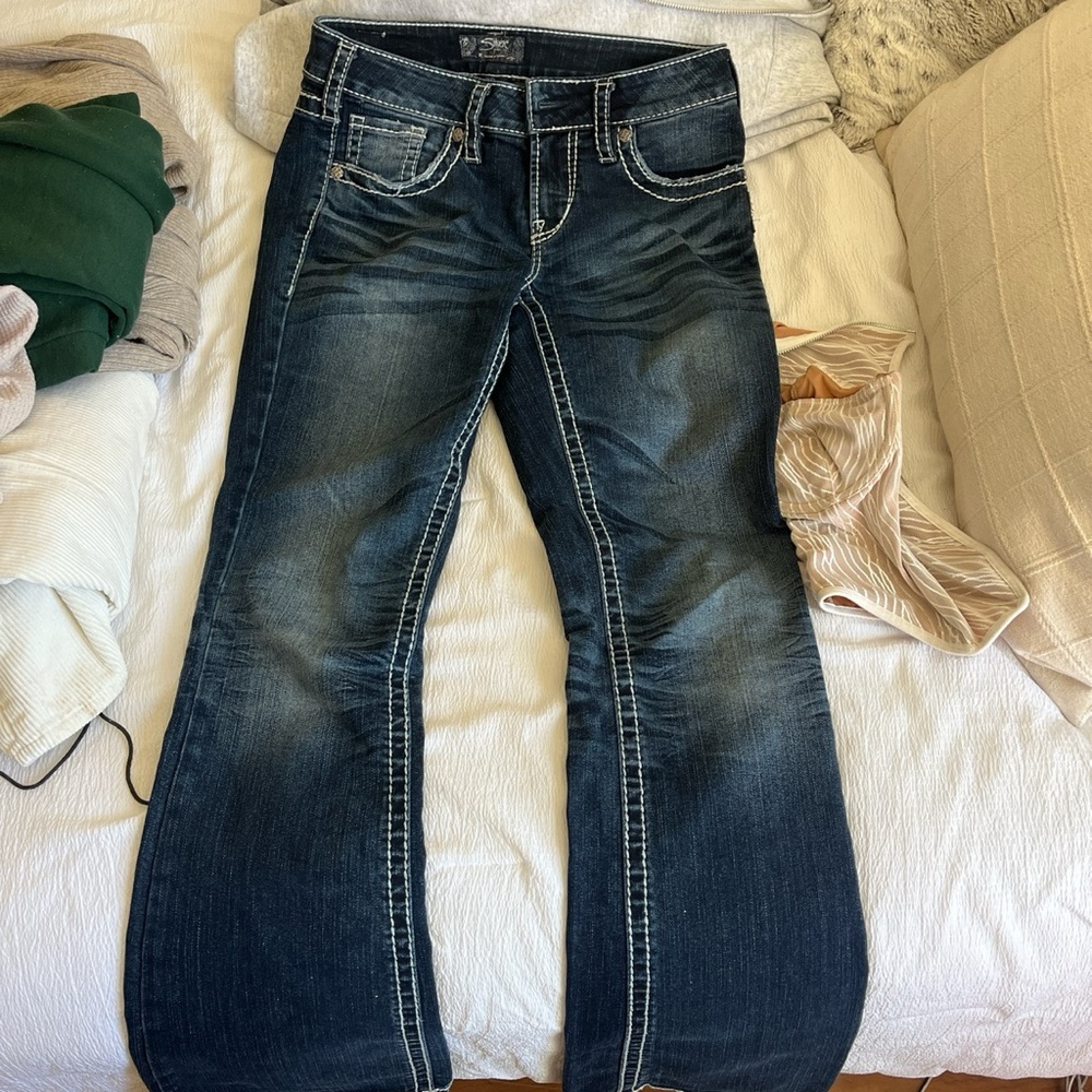 low rise silver brand y2k bootcut jeans, label says size w28/l33